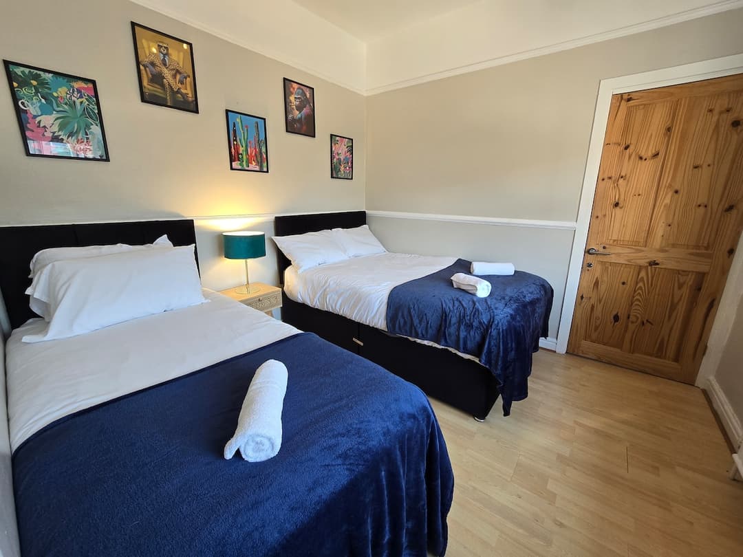 Stylish 4 Bedroom House - Free Parking + Wifi - View 1